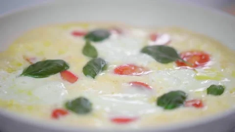 Omelette with mozzarella and tomatoes Stock Footage 245800020