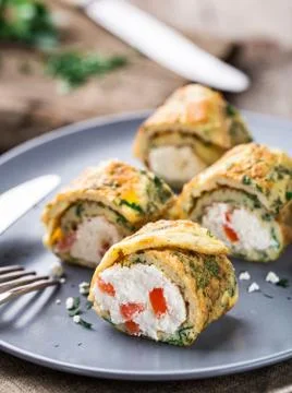 Omelette rolls with curd Stock Photos