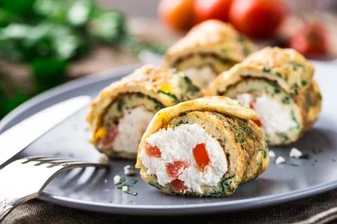 Omelette rolls with curd Stock Photos
