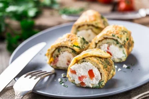 Omelette rolls with curd Stock Photos