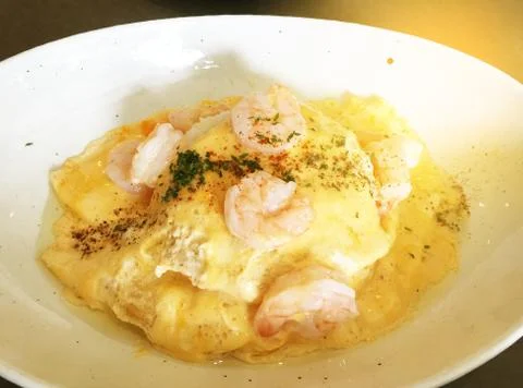 Omelette with shrimps Stock Photos