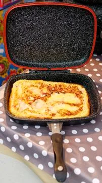 Omelette in a stone pot Stock Photos