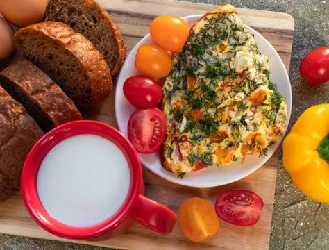 Omelette with tomato Stock Photos