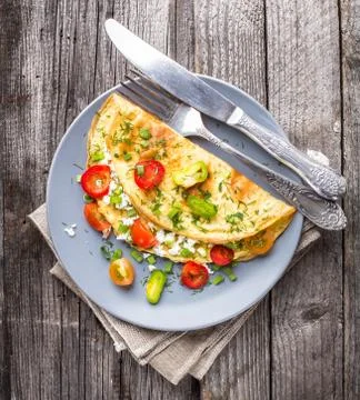 Omelette with vegetables Stock Photos