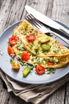 Omelette with vegetables Stock Photos