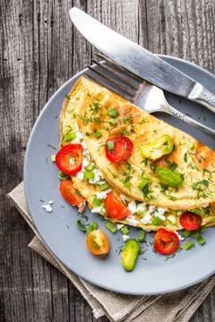 Omelette with vegetables Stock Photos