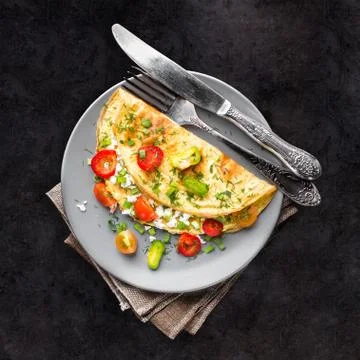 Omelette with vegetables Stock Photos