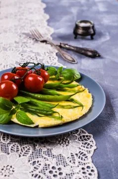 Omelette with vegetables Stock Photos