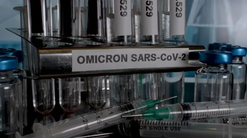Omicron Sample Test Tubes Being Removed From Rack Next To Empty Vial Stock Footage 166039384