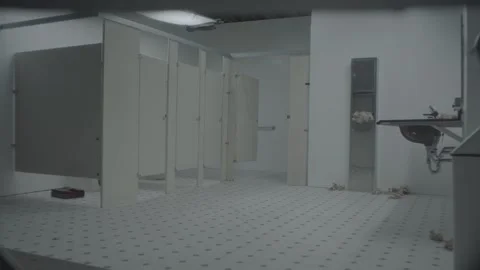 Ominous bathroom interior under fluorescent lighting Stock Footage 136334161