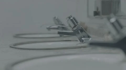Ominous bathroom interior under fluorescent lighting Stock Footage 136334589