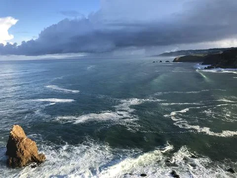 Ominous cloud over beach Foto stock