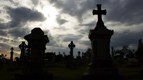Ominous Clouds Gather over Graveyard Vídeo Stock 54637518
