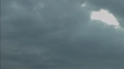 Ominous clouds roiling as night falls Video stock 50023706