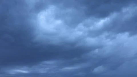 Ominous dark blue storm clouds texture filling the dramatic heavy sky. Stock Footage 323252938