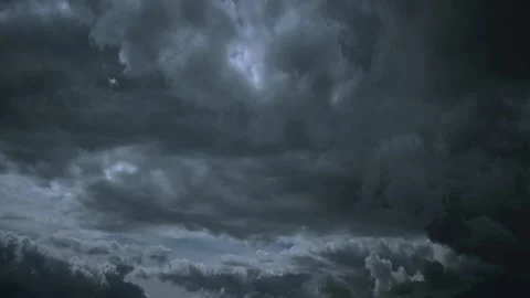 Ominous dark grey storm clouds filling the horizon before rain Stock Footage 331950913