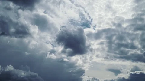 Ominous dark grey storm clouds filling the horizon before rain Stock Footage 341168096