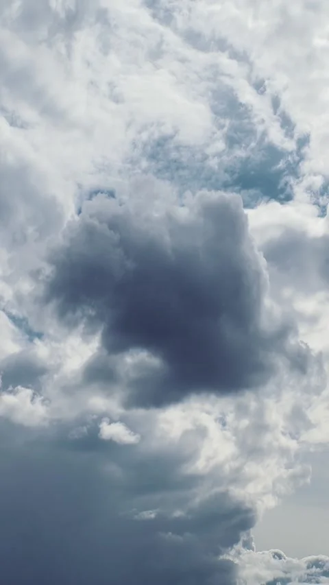 Ominous dark grey storm clouds filling the horizon before rain Stock Footage 341367638