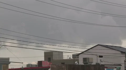 Ominous dark storm clouds on the horizon, black clouds, cumulonibus clouds Stock Footage 40024097