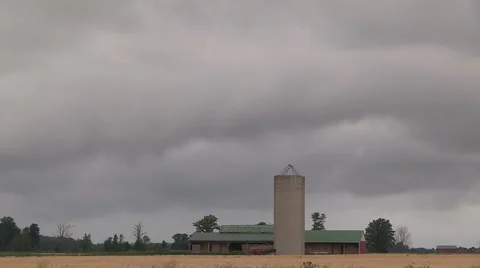 Ominous dark storm clouds on the horizon, black clouds, cumulonibus clouds Stock Footage 40247241