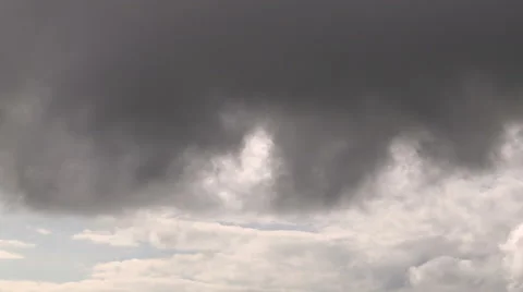 Ominous dark storm clouds on the horizon, black clouds, cumulonibus clouds Stock Footage 40251951