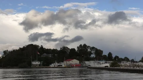 Ominous dark storm clouds rolling in over lake Ontario Stock Footage 140375962