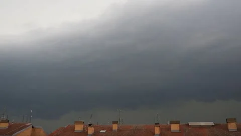 Ominous Dark Storm Clouds Swiftly Surged Across The Sky, Their Heavy Formations Stock Footage 327000064