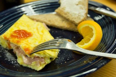 Omlette with toast Stock Photos