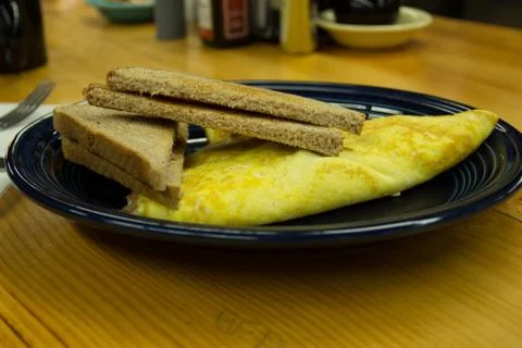 Omlette with toast Stock Photos
