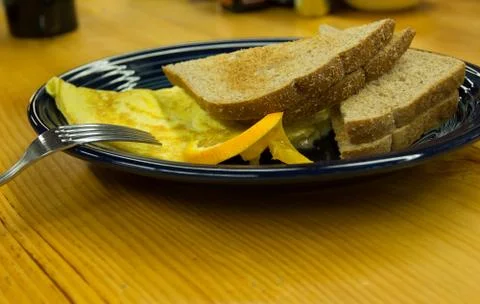 Omlette with toast Stock Photos