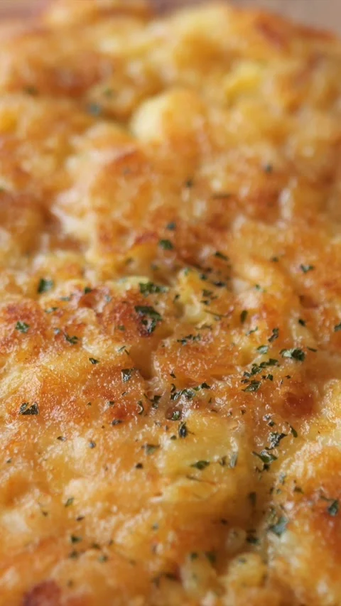 Omlette top down pan, greasy dish typical for slovenia, made of cheese and 動画素材 332728506