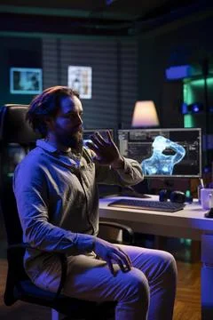 Omniscient evil sentient artificial intelligence possessing IT professional Stock Photos
