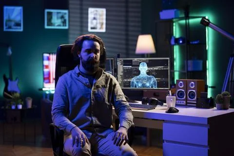 Omniscient evil sentient artificial intelligence possessing IT professional Stock Photos