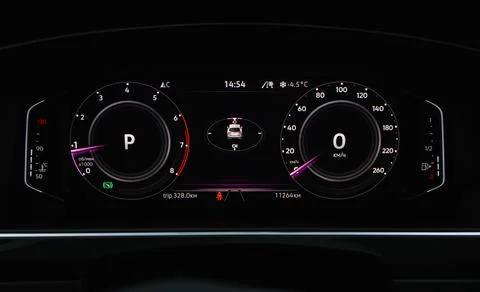 ?ompass on the digital dashboard of modern car. Modern digital car mileage. G Stock Photos