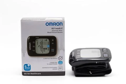 Omron RS7 intelli it automatic wrist blood pressure monitor. Photos