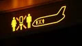 Onboard airplane night flight illuminated WC sign close up 4k or 4k+ Resolution