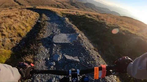 Onboard camera: Mountain biking downhill in stone road in Slate Mountain, Great Stock Footage 103230514