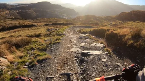 Onboard camera: Mountain biking downhill in stone road in Slate Mountain, Great Stock Footage 103231091