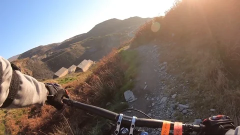 Onboard camera: Mountain biking downhill in stone road in Slate Mountain, Great Stock Footage 103231506