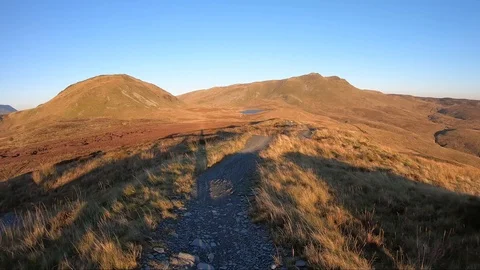 Onboard camera: Mountain biking downhill in stone road in Slate Mountain, Great Stock Footage 103341681