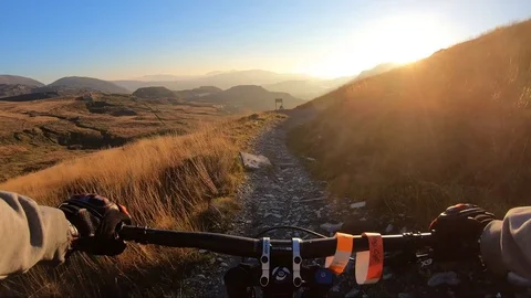 Onboard camera: Mountain biking downhill in stone road in Slate Mountain, Great Stock Footage 103341957
