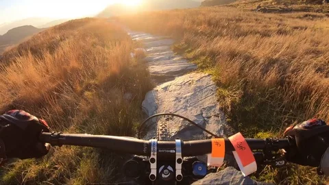Onboard camera: Mountain biking downhill in stone road in Slate Mountain, Great Stock Footage 103342019