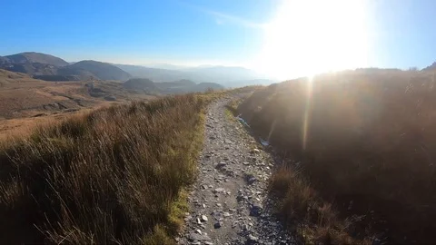 Onboard camera: Mountain biking downhill in stone road in Slate Mountain, Great Stock Footage 107726705
