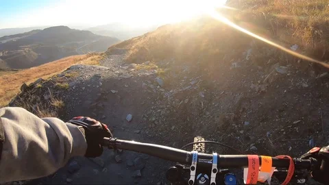 Onboard camera: Mountain biking downhill in stone road in Slate Mountain, Great Stock Footage 107730838