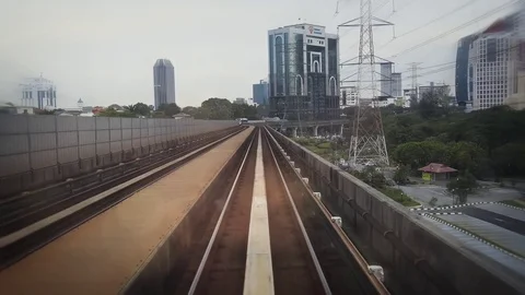 Onboard Perspective of a Ride at Back of a Commuter Train in Kuala Lumpur 库存影片 75324447