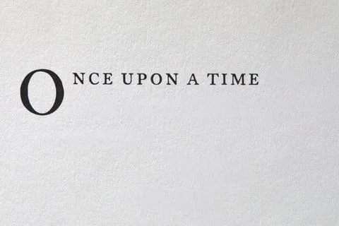 Once Upon A Time typed on white paper Stock Photos