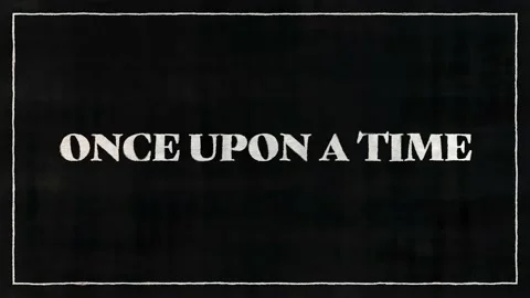 ONCE UPON A TIME White Font On Black Paper Stock Footage 229997190