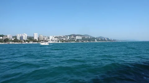 Oncoming Boat On The Background Of The Coast Vídeo Stock 317438229