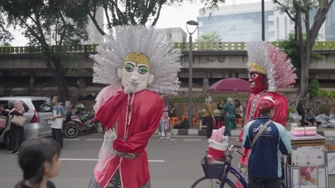 Ondel-ondel large puppet figure Betawi folk performance Jakarta, Indonesia Stock Footage 264768412
