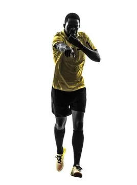 One african man referee running whistling silhouette Stock Photos
